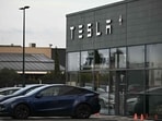 Several Tesla EV owners are sticking 'I bought this before we knew Elon was crazy' stickers on their vehicles. Several Tesla EV owners are sticking 'I bought this before we knew Elon was crazy' stickers on their vehicles.