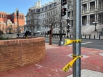 Police tape remains at the scene of an overnight shooting on a street bordering the White House complex, after Secret Service say they shot a man brandishing a firearm in Washington, D.C., U.S. March 9, 2025.   REUTERS/Kia Johnson