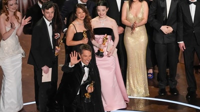 Lindsey Normington, from left, Alex Coco, Vache Tovmasyan, Sean Baker, Samantha Quan, Karren Karagulian Mikey Madison, Drew Daniels, Luna Sofía Miranda, Mark Eydelshteyn, and Yura Borisov accept the award for best picture for "Anora" during the Oscars on Sunday, March 2, 2025, at the Dolby Theatre in Los Angeles. (AP Photo/Chris Pizzello) (Chris Pizzello/Invision/AP) Lindsey Normington, from left, Alex Coco, Vache Tovmasyan, Sean Baker, Samantha Quan, Karren Karagulian Mikey Madison, Drew Daniels, Luna Sofía Miranda, Mark Eydelshteyn, and Yura Borisov accept the award for best picture for "Anora" during the Oscars on Sunday, March 2, 2025, at the Dolby Theatre in Los Angeles. (AP Photo/Chris Pizzello) (Chris Pizzello/Invision/AP)