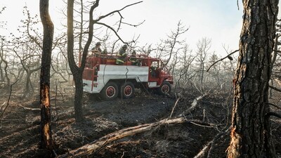 A section of Sunrise Highway between Brooklyn and Long Island's Montauk Point State Park was closed on Saturday night due to the blazes, according to the New York Department of Transportation. (Steve Pfost/Newsday via AP) (AP) A section of Sunrise Highway between Brooklyn and Long Island's Montauk Point State Park was closed on Saturday night due to the blazes, according to the New York Department of Transportation. (Steve Pfost/Newsday via AP) (AP)