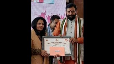 CM Nayab Singh Saini felicitating Rekha Rani Dhiman at an event in Panchkula. (HT File) CM Nayab Singh Saini felicitating Rekha Rani Dhiman at an event in Panchkula. (HT File)