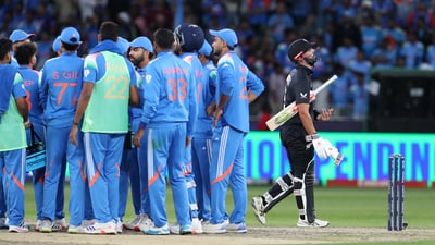 New Zealand's Daryl Mitchell walks back to the pavilion after losing his wicket during their Group A fixture vs India. (REUTERS)