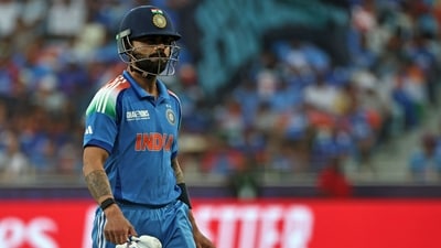 India faced another major blow in the very next over, with Virat Kohli departing for just 1 off 2 balls. Michael Bracewell picked the wicket, putting the Men in Blue under pressure after an electrifying start. (AFP) India faced another major blow in the very next over, with Virat Kohli departing for just 1 off 2 balls. Michael Bracewell picked the wicket, putting the Men in Blue under pressure after an electrifying start. (AFP)