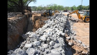 Chandigarh administration razed the Rock Garden wall completely on the intervening night between Saturday and Sunday. (Keshav Singh/HT) Chandigarh administration razed the Rock Garden wall completely on the intervening night between Saturday and Sunday. (Keshav Singh/HT)