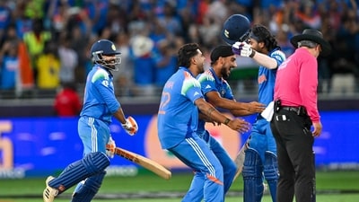 India's players celebrate their victory during the ICC Champions Trophy one-day international (ODI) final cricket match between India and New Zealand at the Dubai International Stadium in Dubai on Sunday. (AFP) India's players celebrate their victory during the ICC Champions Trophy one-day international (ODI) final cricket match between India and New Zealand at the Dubai International Stadium in Dubai on Sunday. (AFP)