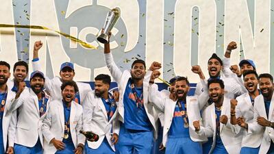 India's players celebrate with the trophy after winning the ICC Champions Trophy final against New Zealand at the Dubai International Stadium on Sunday. (AFP) India's players celebrate with the trophy after winning the ICC Champions Trophy final against New Zealand at the Dubai International Stadium on Sunday. (AFP)
