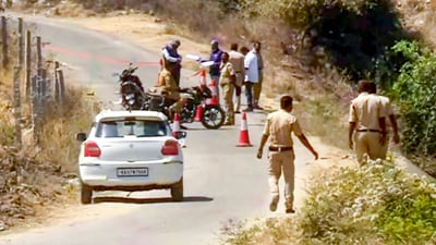 Police personnel conduct an investigation after two women, including a foreign national, were allegedly raped near the Hampi heritage site. (PTI) Police personnel conduct an investigation after two women, including a foreign national, were allegedly raped near the Hampi heritage site. (PTI)