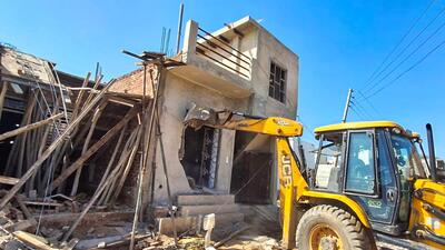 The DTCP team demolishes an illegal construction in Sadhrana village on Sunday (HT Photo) The DTCP team demolishes an illegal construction in Sadhrana village on Sunday (HT Photo)