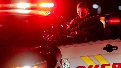 A sheriff is on duty in the vicinity of Francis S. Gabreski Airport in Westhampton, New York. (Photo by David Dee Delgado / GETTY IMAGES NORTH AMERICA / Getty Images via AFP) (Getty Images via AFP) A sheriff is on duty in the vicinity of Francis S. Gabreski Airport in Westhampton, New York. (Photo by David Dee Delgado / GETTY IMAGES NORTH AMERICA / Getty Images via AFP) (Getty Images via AFP)