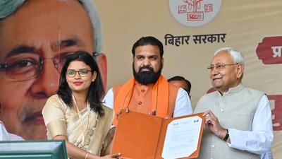 Patna: Bihar Chief Minister Nitish Kumar with Deputy Chief Minister Samrat Choudhary during the distribution of appointment letters to newly appointed teachers, in Patna, Sunday, March 9, 2025. (PTI) Patna: Bihar Chief Minister Nitish Kumar with Deputy Chief Minister Samrat Choudhary during the distribution of appointment letters to newly appointed teachers, in Patna, Sunday, March 9, 2025. (PTI)
