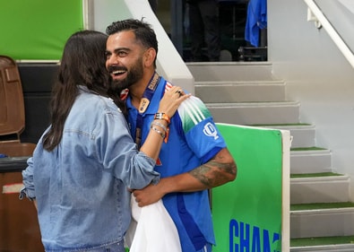 Dubai: Indian cricket team's Virat Kohli celebrates with his wife Anushka Sharma after India won against New Zealand in the ICC Champions Trophy 2025 final cricket match, in Dubai, UAE, Sunday, March 9, 2025. India won by 4 wickets to lift the ICC Champions Trophy 2025. (PTI Photo/Arun Sharma) (PTI03_09_2025_000651B) (PTI) Dubai: Indian cricket team's Virat Kohli celebrates with his wife Anushka Sharma after India won against New Zealand in the ICC Champions Trophy 2025 final cricket match, in Dubai, UAE, Sunday, March 9, 2025. India won by 4 wickets to lift the ICC Champions Trophy 2025. (PTI Photo/Arun Sharma) (PTI03_09_2025_000651B) (PTI)