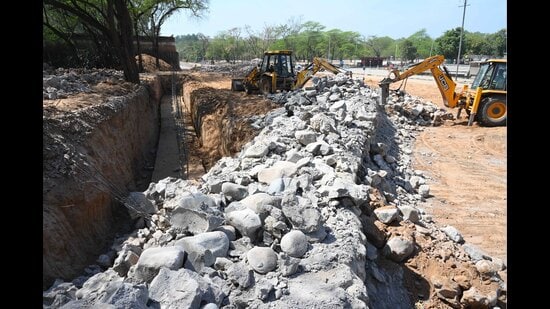 Chandigarh administration razed the Rock Garden wall completely on the intervening night between Saturday and Sunday. (Keshav Singh/HT)