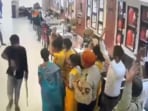 Two of the showroom's executives were injured in the robbery.