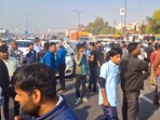 New Delhi: People during a protest by residents of Ghazipur on Akshardham-Ghaziabad road against the alleged murder of a young man, in Delhi, Monday, March 10, 2025.