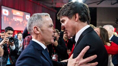 Mark Carney, Leader of the Liberal Party of Canada, embraces Prime Minister Justin Trudeau after being announced the winner at the Liberal leadership Event in Ottawa, Ontario, on Sunday, (AP) Mark Carney, Leader of the Liberal Party of Canada, embraces Prime Minister Justin Trudeau after being announced the winner at the Liberal leadership Event in Ottawa, Ontario, on Sunday, (AP)