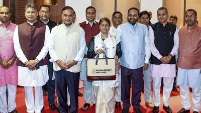 Assam chief minister Himanta Biswa Sarma and finance minister Ajanta Neog with others before the presentation of the state Budget in the Legislative Assembly in Guwahati on Monday. (PTI) Assam chief minister Himanta Biswa Sarma and finance minister Ajanta Neog with others before the presentation of the state Budget in the Legislative Assembly in Guwahati on Monday. (PTI)