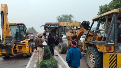 Efforts on to rescue passengers after a collision between a bus and a tractor-trolley near Jallowal village on the Jalandhar-Jammu highway early on Monday. (HT Photo)