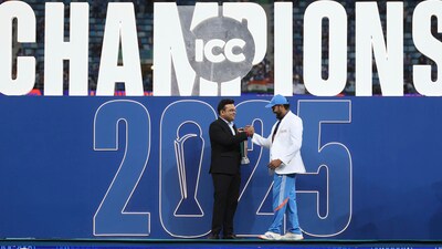 India's captain Rohit Sharma receives the winners trophy from ICC Chairman Jay Shah. (AP)