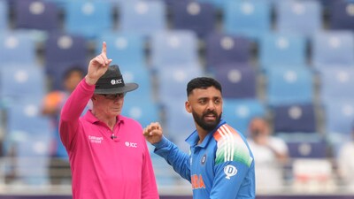 India's bowler Varun Chakravarthy celebrates the wicket of New Zealand's batter Will Young. (PTI) India's bowler Varun Chakravarthy celebrates the wicket of New Zealand's batter Will Young. (PTI)