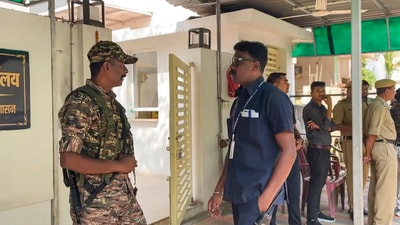Security personnel stand guard during raids by the Enforcement Directorate (ED) on premises linked to Chaitanya Baghel, son of former Chhattisgarh chief minister and Congress leader Bhupesh Baghel. (PTI)