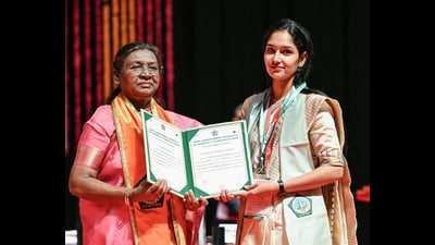 President Droupadi Murmu awarding degree to a girl during the convocation ceremony of Guru Jambheshwar University of Science and Technology in Hisar on Monday. (ANI) President Droupadi Murmu awarding degree to a girl during the convocation ceremony of Guru Jambheshwar University of Science and Technology in Hisar on Monday. (ANI)
