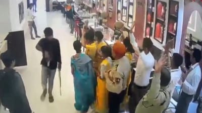 Two of the showroom's executives were injured in the robbery. Two of the showroom's executives were injured in the robbery.