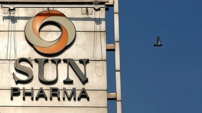 A bird flies past the logo of Sun Pharma installed on the facade of its corporate office in Mumbai, India, November 14, 2017. (Shailesh Andrade/Reuters)