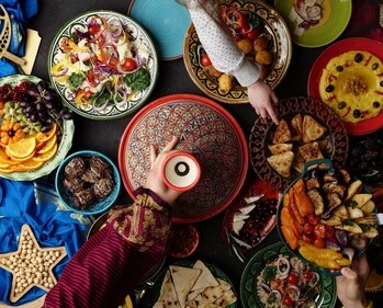 Prepare a beautiful Middle-Eastern iftar and add some traditional sweets and drinks to it. (Shutterstock)