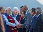 Prime Minister Narendra Modi being welcomed upon his arrival as his Mauritius counterpart Navin Ramgoolam looks on, in Mauritius. 
