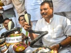 Congress MLAs in Madhya Pradesh staged a protest with plastic snakes accusing the BJP of sitting on government job vacancies like a serpent Congress MLAs in Madhya Pradesh staged a protest with plastic snakes accusing the BJP of sitting on government job vacancies like a serpent