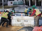 Workers put traffic barriers in place as they start the work to transform Black Lives Matter Plaza into Liberty Plaza on March 10, 2025 in Washington, Workers put traffic barriers in place as they start the work to transform Black Lives Matter Plaza into Liberty Plaza on March 10, 2025 in Washington,