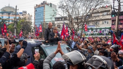Supporters welcome Nepal's former King Gyanendra Shah upon his arrival at Tribhuvan International Airport in Kathmandu, Nepal, Sunday, March 9, 2025. (AP) Supporters welcome Nepal's former King Gyanendra Shah upon his arrival at Tribhuvan International Airport in Kathmandu, Nepal, Sunday, March 9, 2025. (AP)