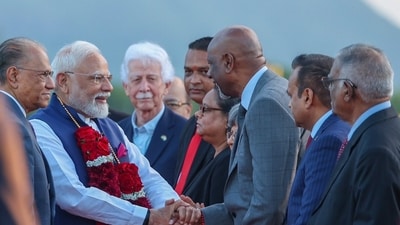 Prime Minister Narendra Modi being welcomed upon his arrival as his Mauritius counterpart Navin Ramgoolam looks on, in Mauritius. (X-@MEAIndia) Prime Minister Narendra Modi being welcomed upon his arrival as his Mauritius counterpart Navin Ramgoolam looks on, in Mauritius. (X-@MEAIndia)