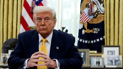 US President Donald Trump sits in the Oval Office of the White House in Washington, DC on March 7. (Reuters)