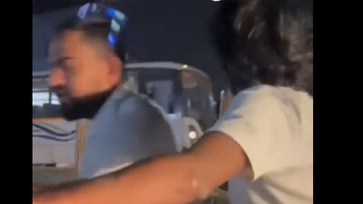 Two men slash the car window at Bengaluru's TC Palya in a road rage incident. (Screen grab from viral X video)