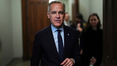 Mark Carney dubbed the US president's latest tariffs as an attack on Canadian workers, families and businesses. (AP)