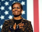 Michelle Obama reveals her podcast with Craig Robinson, 'IMO,' launching Wednesday. (AP Photo/Jacquelyn Martin, File) Michelle Obama reveals her podcast with Craig Robinson, 'IMO,' launching Wednesday. (AP Photo/Jacquelyn Martin, File)
