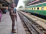 A paramilitary soldier stands guard at a railway station in the Sibi district of southwestern Balochistan province on March 12, 2025, during a security operation against militants a day after they hijacked a passenger train. 