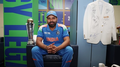 India's captain Rohit Sharma poses for a picture with the Champions Trophy in Dubai (ICC- X) India's captain Rohit Sharma poses for a picture with the Champions Trophy in Dubai (ICC- X)