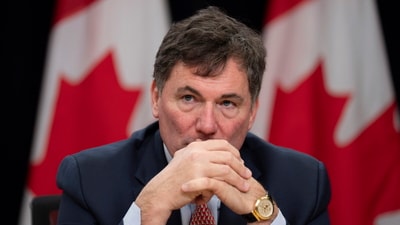 Canada finance and Intergovernmental affairs minister Dominic LeBlanc listens to a speaker during a news conference on tariffs. (AP) Canada finance and Intergovernmental affairs minister Dominic LeBlanc listens to a speaker during a news conference on tariffs. (AP)
