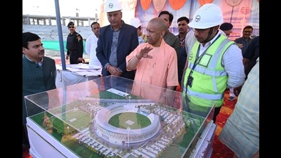 Chief minister Yogi Adityanath inspecting the under-construction international cricket stadium at Ganjari in Varanasi (PTI) Chief minister Yogi Adityanath inspecting the under-construction international cricket stadium at Ganjari in Varanasi (PTI)