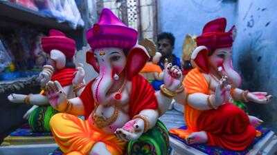 Pen, India - Aug. 9, 2019: A painter works on an idol of Lord Ganesha at a workshop at Pen,,Raigad district, Maharashtra. As September approaches brining with it Ganesh Chaturthi, on of Maharashtra's biggest festivals, India, on Friday, August 9, 2019. (Photo by Satish Bate/Hindustan Times) (Satish Bate/HT Photo) Pen, India - Aug. 9, 2019: A painter works on an idol of Lord Ganesha at a workshop at Pen,,Raigad district, Maharashtra. As September approaches brining with it Ganesh Chaturthi, on of Maharashtra's biggest festivals, India, on Friday, August 9, 2019. (Photo by Satish Bate/Hindustan Times) (Satish Bate/HT Photo)