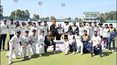 Punjab lifted the U-23 CK Nayudu Trophy after its match against Rest of India ended in a draw at the IS Bindra PCA Stadium in Mohali on Wednesday. (HT Photo)
