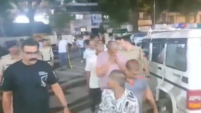 Police escorting shaved-headed youths in Madhya Pradesh's Dewas district. (Screengrab)