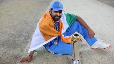 India captain Rohit Sharma with the Champions Trophy (AP) India captain Rohit Sharma with the Champions Trophy (AP)