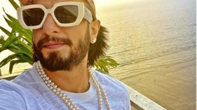 Ranveer Singh’s waist-grazing pearl strings have become his signature style. Styled with bold outfits and deep-neck shirts, they add a modern edge to his look. (Instagram) Ranveer Singh’s waist-grazing pearl strings have become his signature style. Styled with bold outfits and deep-neck shirts, they add a modern edge to his look. (Instagram)