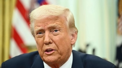 US President Donald Trump speaks as he prepares to sign executive orders in the Oval Office of the White House in Washington, DC on March 6, 2025. (AFP)
