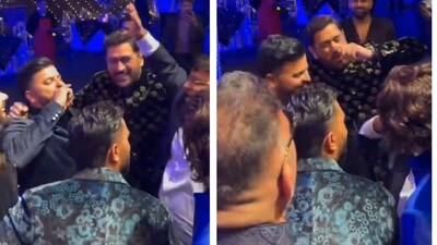 MS Dhoni and Suresh Raina dancing at Rishabh Pant's sister's wedding MS Dhoni and Suresh Raina dancing at Rishabh Pant's sister's wedding
