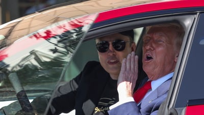Donald Trump and Elon Musk sit in a Tesla car model S, in front of the White House in Washington, DC, on March 11, 2025.&nbsp; (Kevin Lamarque/REUTERS)