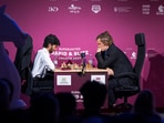 D Gukesh and Magnus Carlsen during a match. D Gukesh and Magnus Carlsen during a match.